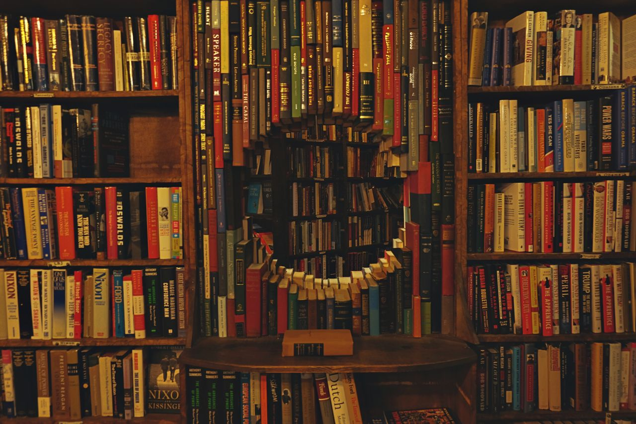 Charming bookstore with unique circular book arrangement creating visual interest and appeal.